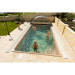 Abri de piscine télecopique rabattu